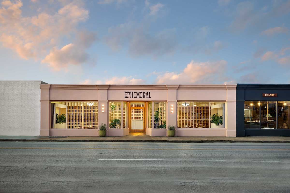 Ephemeral's pink storefront at dusk